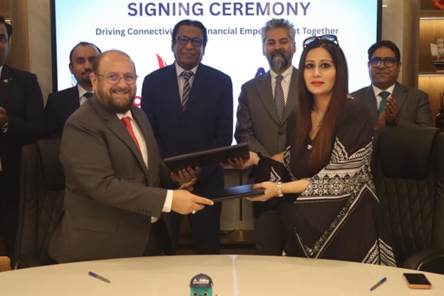 ABHI Microfinance Bank officials with SOS Group and South Air representatives at the partnership signing ceremony