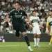 Real Madrid players celebrate after Carlos Espi scores the late winner against Elche.