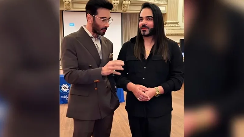 Faysal Quraishi discussing fitness and weight loss advice with Sparrow Butt