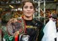 Pakistan MMA fighter Manesha Ali celebrates after winning gold at the IMMAF World Cup