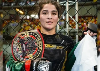 Pakistan MMA fighter Manesha Ali celebrates after winning gold at the IMMAF World Cup