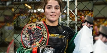 Pakistan MMA fighter Manesha Ali celebrates after winning gold at the IMMAF World Cup
