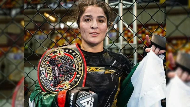 Pakistan MMA fighter Manesha Ali celebrates after winning gold at the IMMAF World Cup