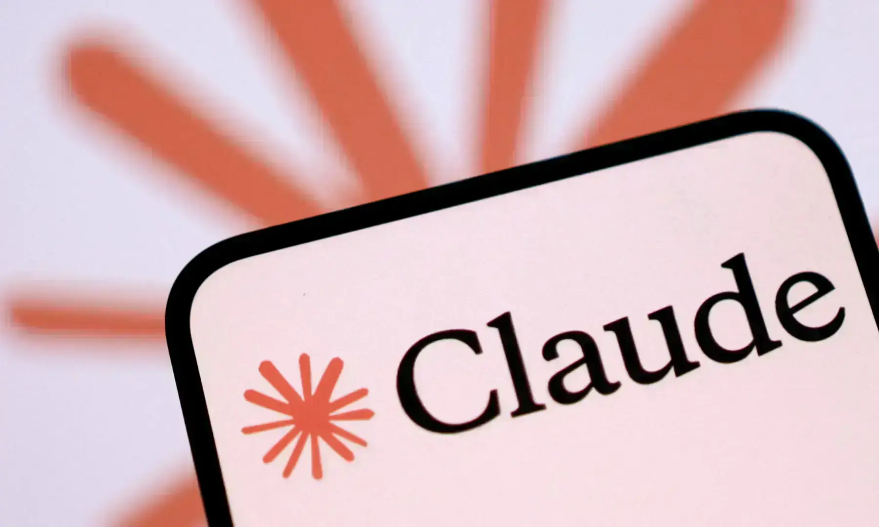 Anthropic Claude AI logo illustrating the debate over AI consciousness and model welfare.
