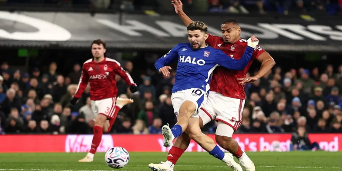 Nottingham Forest players compete against Ipswich Town during their 1-1 Premier League match at Portman Road.