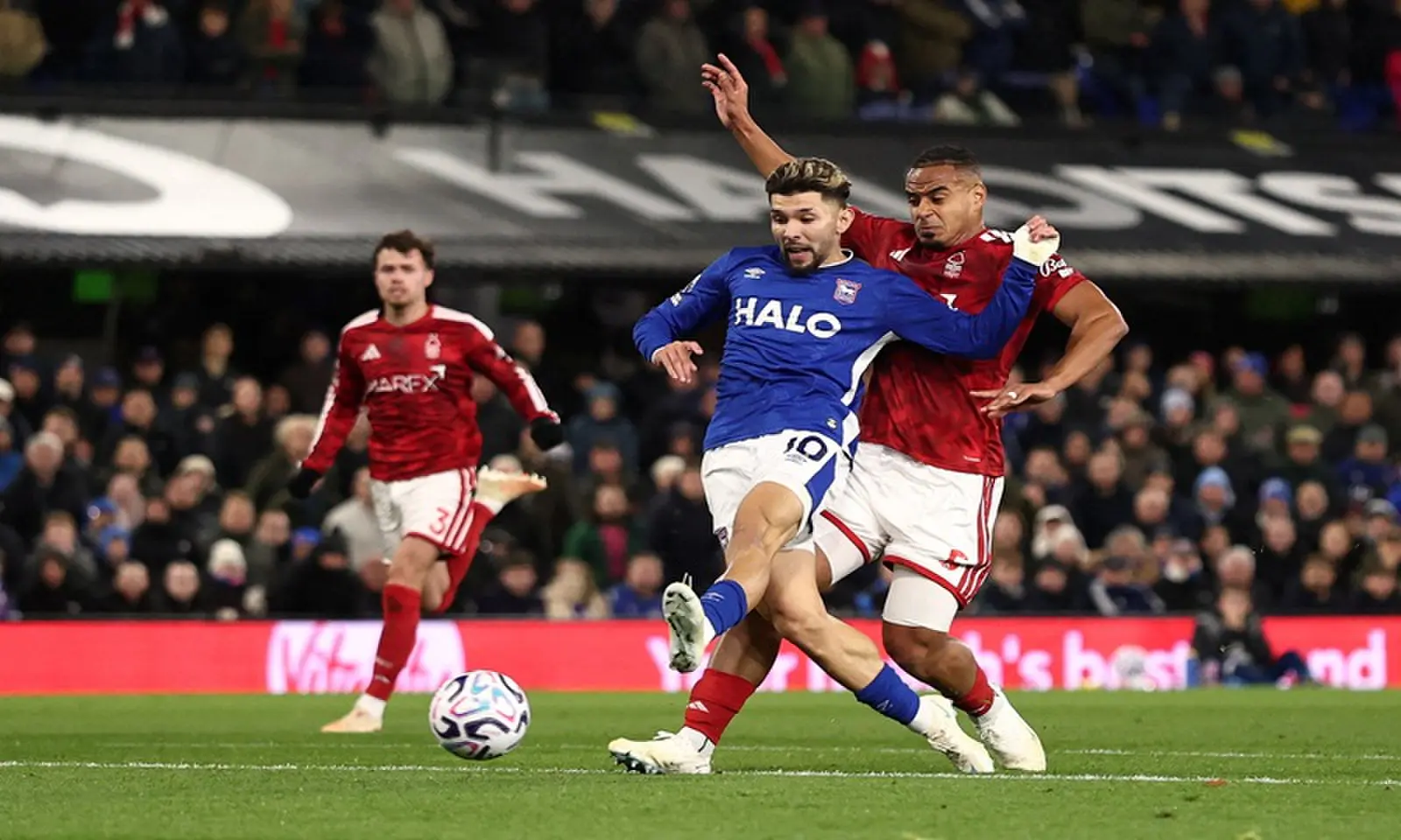 Nottingham Forest players compete against Ipswich Town during their 1-1 Premier League match at Portman Road.