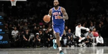 LeBron James in a Philadelphia 76ers uniform during his pre-season debut against the Brooklyn Nets.