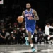 LeBron James in a Philadelphia 76ers uniform during his pre-season debut against the Brooklyn Nets.