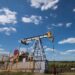 Oil storage tanks and crude oil infrastructure amid changing global prices and Russian supply concerns.