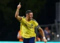 Cristiano Ronaldo of Al Nassr celebrates during a match against Al Faisaly amid controversy over the official credit for his 982nd career goal.