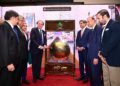 Muhammad Aurangzeb at the Pakistan Stock Exchange gong ceremony for Naya Nazimabad REIT