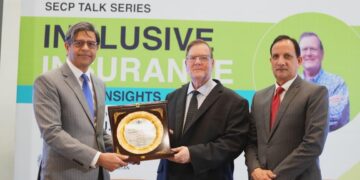 SECP officials and insurance experts discuss inclusive insurance in Pakistan.