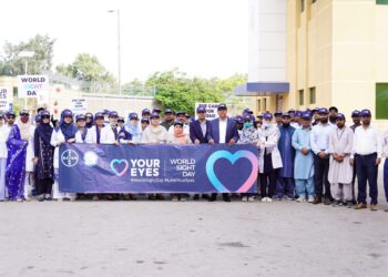 Ophthalmologists at a World Sight Day awareness seminar discussing glaucoma and vision loss at Dow University in Karachi.