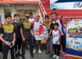 Participants take part in sports activities organised by the Consulate General of Malaysia in Karachi for National Sports Day 2026.