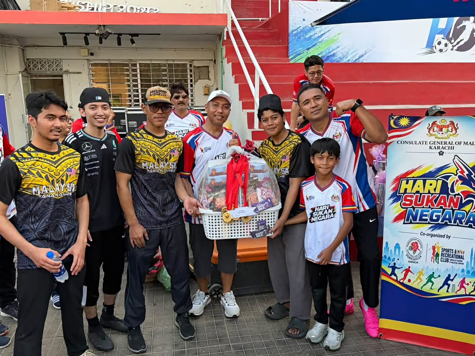 Participants take part in sports activities organised by the Consulate General of Malaysia in Karachi for National Sports Day 2026.