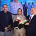 Brigadier Yaqoob Awan, Hanif Gohar, Atiq-ur-Rehman Allahwala and other guests pose for a commemorative photograph at a Karachi dinner. Photo: Muhammad Rizwan.
