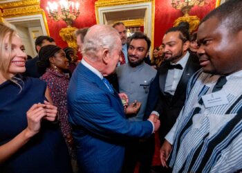 Pakistani youth leaders Danish Sohail and Joshua Dilawar at the QECT 100 Young Leaders reception in London.