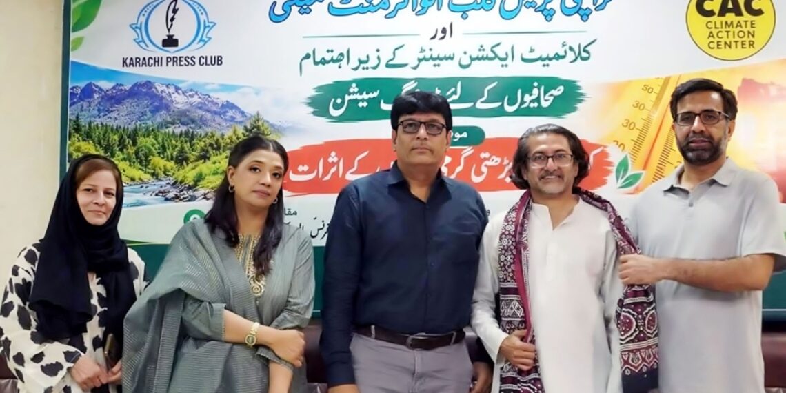 Yasir Hussain addresses journalists at a Karachi Press Club seminar on heatwave safety and climate change.