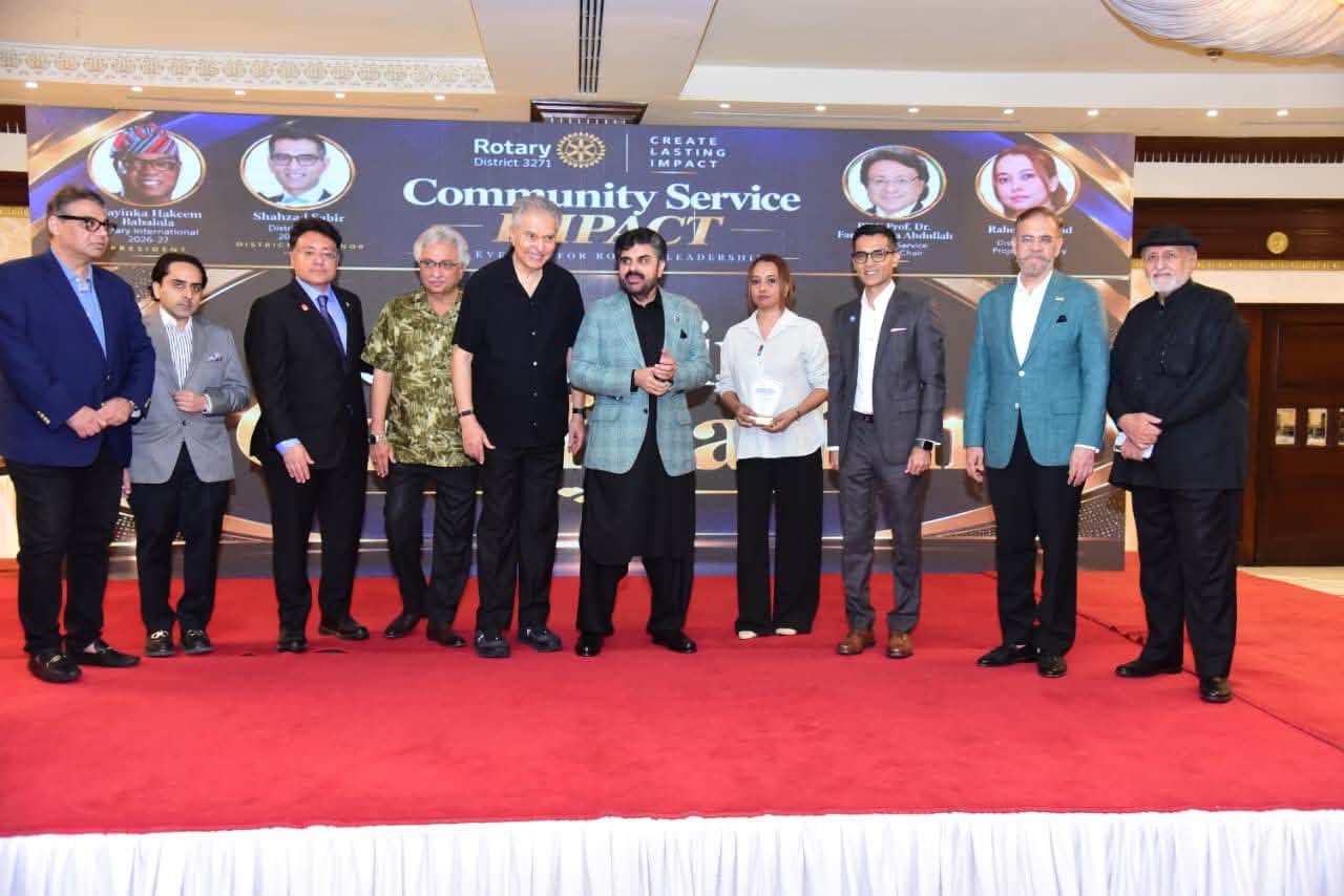 Nasir Hussain Shah with Rotary District 3271 leaders at the Community Service Impact event in Karachi.