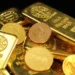 Gold bars and jewellery displayed at a market as gold prices fall in Pakistan.