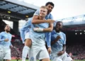 Manchester City players celebrate a goal during their Premier League match against Liverpool.