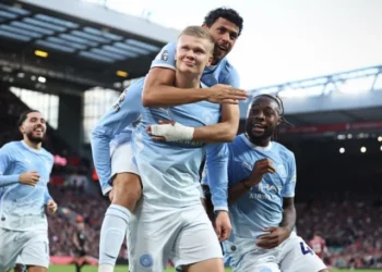 Manchester City players celebrate a goal during their Premier League match against Liverpool.