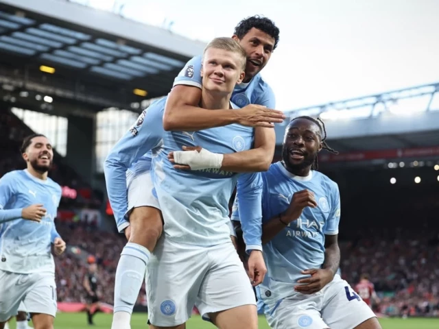 Manchester City players celebrate a goal during their Premier League match against Liverpool.