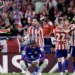 Atletico Madrid players celebrate after scoring against Manchester United in the Champions League.