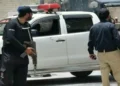 Security personnel at an attack site in Dera Ismail Khan, Khyber Pakhtunkhwa