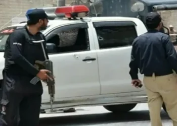 Security personnel at an attack site in Dera Ismail Khan, Khyber Pakhtunkhwa