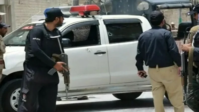 Security personnel at an attack site in Dera Ismail Khan, Khyber Pakhtunkhwa
