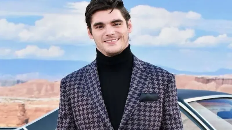 RJ Mitte, who played Walter White Jr. in Breaking Bad, and co-star Bryan Cranston.