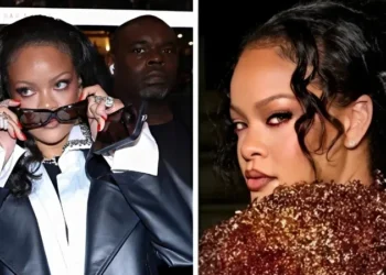 Rihanna wearing bold red eyeliner along her lower waterline at Paris Fashion Week