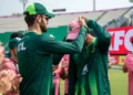 Pakistan cricket team in pink kits ahead of their ODI tri-series match against England at Gaddafi Stadium in Lahore.