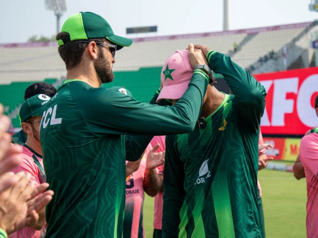 Pakistan cricket team in pink kits ahead of their ODI tri-series match against England at Gaddafi Stadium in Lahore.