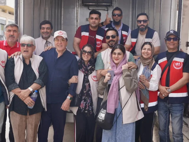 Pakistani actors distribute humanitarian aid to Palestinian families in Jordan.