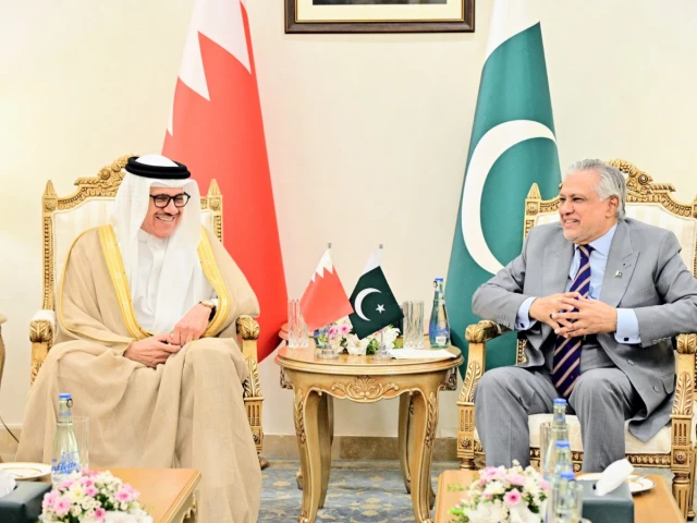 Ishaq Dar and Bahrain Foreign Minister Abdullatif Al Zayani during Pakistan-Bahrain talks in Islamabad.